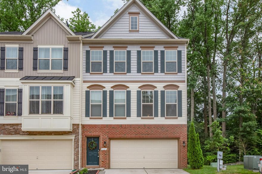 Gorgeous 4 bed, 3.5 bath end unit with spacious 3-level bump-out.   Open concept main floor with 9 ft ceilings and  beautiful hardwood flooring. Kitchen has stainless steel appliances, granite countertops and counter seating at the island.  Morning room off kitchen leads to Trex deck.  In addition to the office, the main level includes formal sitting area, large dining room and family room area.  Over-sized owners’  suite with Trey ceilings. Master bath has soaking tub, shower  and double sinks. The suite includes a sitting area and large walk in closet.  Washer and dryer are on bedroom level.  Fully finished basement includes a rec room (that opens to brick patio) and large bedroom with full bath.  Convenient to I-95 and VRE.