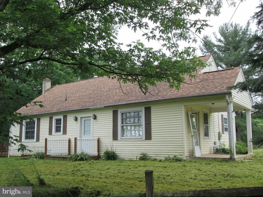 Older Cape Cod on 2.67 acre lot. Private country setting yet close to schools, shopping, hospital. hardwood floors on main level, has walk-up attic which could be 4th bedroom or office. Home has lots of potential.