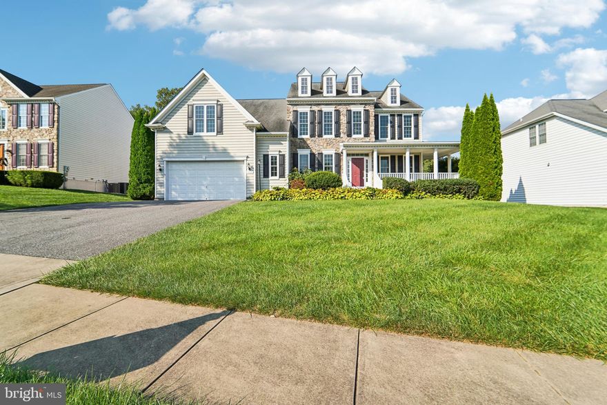 Seize the opportunity to make this magnificent residence your own, located on the premier lot in Sterling Glen, Mount Airy! 1514 Terra Oaks Ct stands out with the largest floor plan in the community, offering an expansive living experience. With over 4,200 square feet on the main and upper levels and an unfinished lower level with potential for additional space, this home is set on an impressive 14,000 square foot lot. The property backs onto a tranquil nature preserve, providing stunning sunset views, and open skies for a firepit. From the inviting front porch to the exceptional open-concept main level designed for entertaining, this home radiates a sense of meticulous care. Upon entering, you'll be greeted by a modern, open layout featuring soaring ceilings and generously sized rooms. The grand foyer opens into a breathtaking great room with dramatic ceilings, seamlessly transitioning to the living area on one side. Flanking this space are an elegant dining room and a private home office with a bay window, both adorned with exquisite crown molding. The great room flows effortlessly into a chef's dream kitchen, which boasts a large center island and a sunlit breakfast nook. A convenient main-level mudroom and laundry room provide access to the garage and driveway. The impressive two-story family room features a stunning wall of windows and a striking gas fireplace, creating a warm and inviting atmosphere perfect for gatherings. The gourmet kitchen is a highlight with its ample cabinetry, walk-in pantry, granite countertops, gas cooktop, double wall ovens, and a spacious island with seating. The adjoining breakfast room, filled with natural light, opens to a deck ideal for relaxing and savoring those breathtaking sunset views. Upstairs, the luxurious owner's suite offers a large walk-in closet, dual sinks, a soaking tub, and a separate shower. Two additional well-sized bedrooms share a hall bathroom equipped with dual sinks and a linen closet and a fourth bedroom with its own bathroom. The lower level remains unfinished, presenting a blank canvas for your personal touch and customization. This home is ready for you to move in and start making memories. Schedule your tour today and experience the exceptional living space and serene surroundings for yourself!