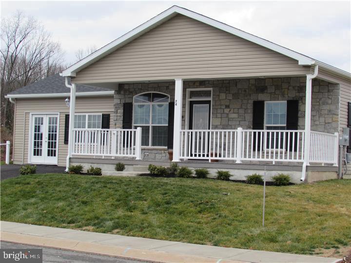'REDUCED' Adult 55+ Community, A Pine Grove Model Home with all the bells and whistles, never used. 2 Car Garage,This house has it all, Pilars in Living Room, Corian counter tops with Double Bowl Porcelain sink, Upgraded Cappucine  Cabinets,S/S Gas Appliance Pkg. glass back splash, French Door Refrigerator, large Breakfast bar with overhang, 9' ceilings through out, 42" Cabinets, Upgraded carpeting in bedrooms, Laminate flooring in  remainder of house, Cultured marble bathroom counter tops, Double bowl in Master Bedroom,  large Ceramic Title shower in Master Bathroom, Tray ceiling in Master Bedroom, Gas Granite Surround Heatilator Fireplace in Family Room, 12 x 12 Synthetic Deck off kitchen, Open floor plan with professional decorated window treatments. Lot lease includes Grass cutting, Snow removal streets and sidewalk, club house with Gym, party room gathering room with games, kitchen and outdoor heated pool.  Every Picture was Professional taken.