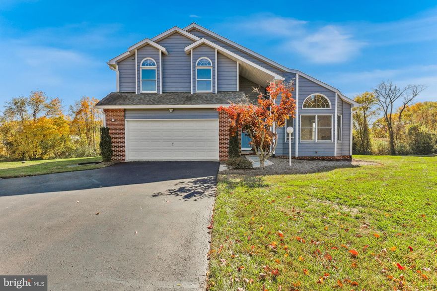 Spacious custom-built multi-generational contemporary home on 3.16 acres that backs to an 87.9 acres Agricultural Preservation Easement. Beautifully nestled community of only 15 custom built homes all situated on a quiet, private street.  2 story open foyer w/dramatic floating wood stair case invites you in.  Main level contains Living & Dining area with vaulted ceilings, Whitford Pellet Stove and Palladian windows allowing plenty of sunshine throughout.  Kitchen with breakfast area, skylights, plenty of counter space and cabinetry.  Family Room nearby with wood stove and French door to outside rear deck and extended gazebo. Primary bedroom & bath with newly installed dual vanities with marble tops, medicine cabinets and LED lighting. Upper level with new carpeting hosts 2 bedrooms with adjoining bathroom as well as a secondary primary bedroom/bathroom with private deck/balcony offering amazing views of property and beyond. Fully finished lower level rec room with den, 2 additional bonus rooms and full bathroom. This house is presently located in the #1 out of 24 Maryland  school districts rated by Niche.com.