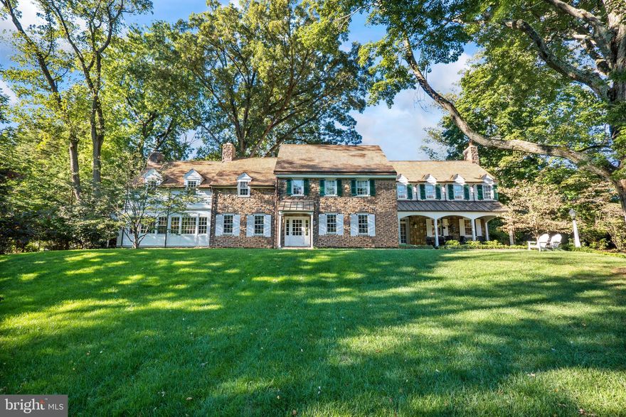 Down a quiet lane, you travel the curved drive to get the first glimpse of this classic Haverford beauty. Welcome to 45 Tunbridge Road, a 1920’s Main Line estate, elegant yet completely updated with all the modern amenities and situated on almost two private acres. 

The solid construction creates a home that is welcoming with elegance and grace, yet completely functional for your ease of living. A classic floor plan allows for comfortable family gatherings as well as fabulous entertaining. An abundance of windows and natural light, brings views of the beautiful grounds into the home. 

This 7500sq ft home has numerous permanent pieces thoughtfully collected from around the world as stated in the attached “owners” remarks.

Upon entering, you are greeted by a gracious reception hall. The formal living room, accentuated with a brick and wood mantle fireplace, is ideal for conversation. A study with French limestone floors with radiant heat  a wood burning fireplace and built-ins creates the perfect work from home space. The generous sized dining room has elegant wainscoting and can accommodate large gatherings perfect for celebrating warm holidays and family get-togethers with a butler’s pantry off the to the side of the dining room.

The kitchen will delight any gourmand with its custom cabinetry, chef appliances and oversized island, which is a refurbished antique general store counter from Canada dating to the 1800’s.  

The family room addition with soaring ceilings, stone fireplace, random width barn wood floors, custom cabinetry and 300-year-old beams. Two pair of French doors lead to a covered back porch. See attached “owners” remarks.

Outdoors, the stone terrace beckons for morning coffee or evening drinks. The flow is perfect for entertaining family and friends. But for the busy household, off the kitchen is where you’ll find a mudroom, walk-in closet, two powder rooms and a back stairwell. 

The second floor offers solace and rejuvenation in five beautifully designed bedroom suites. The generously sized primary bedroom suite with fireplace offers a large walk-in closet/dressing area and sumptuous bath. The bath is fitted with reclaimed walnut flooring, tile, and steam shower. The porcelain pedestal tub is 100 years old with original working hardware from Vancouver Canada. The console sink is antique from France. There is also a small laundry area on this level.
 
The third floor offers the fifth bedroom suite, walk-in cedar closet and additional storage. The basement consists of a game room, stone fireplace and powder room and laundry room. The 4-car garage was built in 2018 featuring a large, heated workshop. There is a charming storage barn/potting shed that Martha Stewart would envy. Mature trees and landscaping complete your private escape.
  
Come live the lifestyle you’ve earned and imagined. Welcome home to 45 Tunbridge Road.