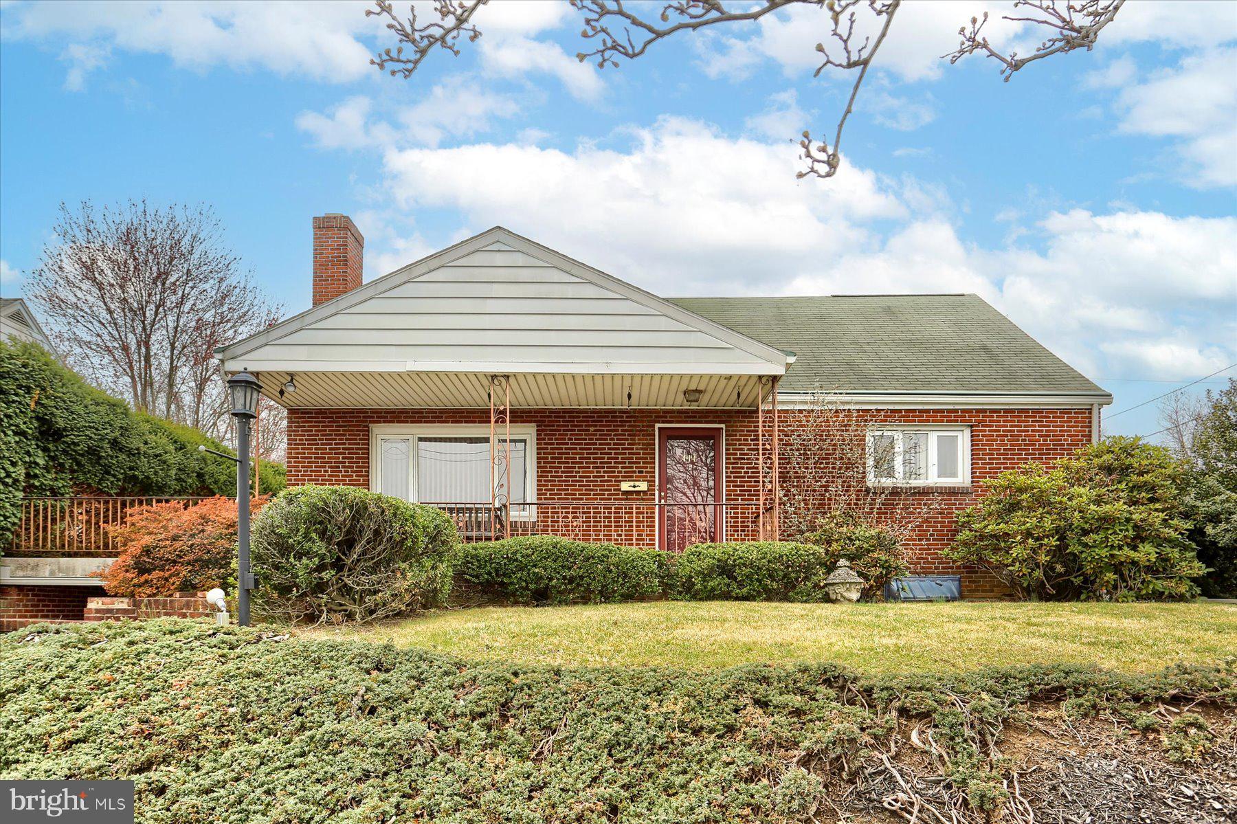 Mid-century cape cod style home with all the classic built-ins! Large living room with fireplace! Kitchen features bar top space and spills out to a formal dining room with custom built-ins! Two large bedrooms and full bath on the first floor and an additional two bedrooms and full bath on the second floor! Oversized enclosed patio, perfect to enjoy summer gatherings! Full, walk-out basement with half bath (current owner used as a beauty salon) is perfect for the work from home person! One-car carport and seconds from all your favorite hang-out spots!