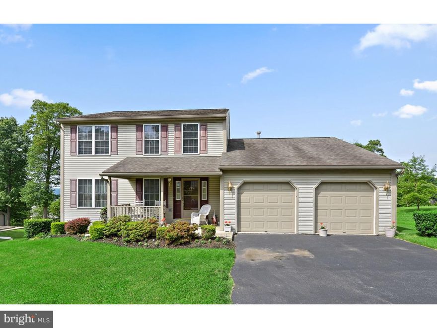 Spacious 3-bedroom, 2.5 bath traditional home in Blue Mountain's Sunnyside development. First floor highlights include tiled entranceway with convenient half bath, adjoining living and dining rooms, large eat-in-kitchen, and separate laundry room. The cook's space includes a center island, pantry, and spacious area for informal dining highlighted by sliding doors to deck for outdoor dining and enjoyment. Also, on the first floor is the bonus family room - truly oversized and conveniently located off the kitchen, it is perfect for gatherings of family and friends. The second floor has three bedrooms, including the master bedroom with private bath and walk-in closet. The two guest bedrooms, both with six-panel door closets, share the guest bath with walk-in shower. The lower level is a walk-out basement to the rear yard and is ready for your vision - extra bedroom, recreation room, workshop, or just extra storage space. All the amenities one would expect with a newer build are included such as two-car garage, central air, and economical gas heat. Although only 15 years young, sellers are offering a one-year home warranty for buyer peace of mind.