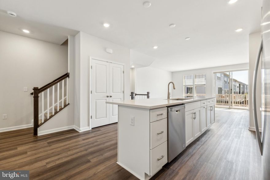 MOVE IN READY!!  Offering Conventional 1/0 buy-down at 4.99% year one and 5.99% years 2-30!! Or FHA/VA 2/1 buydown year One 4.25,% year Two 5.25% and years 3-30 6.25% CLOSE IN FEB 2025! Stunning Brand NEW home in a charming community – FINAL OPPORTUNITY! 

Move right in to this never-lived-in gem, nestled in a picturesque community brimming with old-town charm. Located just a short stroll from the Manassas VRE station, you’ll enjoy easy access to local favorites, including wonderful restaurants, wine tastings, boutique shops, the Harris Pavilion, and the vibrant Farmer’s Market.

This newly built townhome dazzles with modern luxury. From the moment you step through the front door, you'll be greeted by an open foyer with Recreation Room, powder room, and oak staircase leading you to the main level. The chef’s kitchen is a showstopper, featuring high-end finishes like shaker-style white cabinetry, sparkling quartz countertops, and a stunning chevron mosaic tile backsplash. The oversized island seamlessly connects to the dining and great rooms, creating the ideal space for daily living and entertaining. Retreat to the Primary suite, which offers walk-in closet and luxurious en-suite bathroom. Additional 2 upper level bedrooms provide plenty of space for family, a home office, or guest accommodations. Outside, the spacious deck is a true oasis, featuring low maintenance Trex boards and vinyl railings, ideal for summer barbecues, or a tranquil space for relaxation. 

This thoughtfully designed community features a serene courtyard with an outdoor firepit surrounded by cozy conversation seating, a bike rack, and a community garden—perfect for savoring fresh blooms and produce this spring! Don’t miss this final opportunity to own a brand-new home in Jefferson Square- a community that blends modern convenience with timeless charm. 

By Appointment Only.  Closed Wednesday and Thursday.