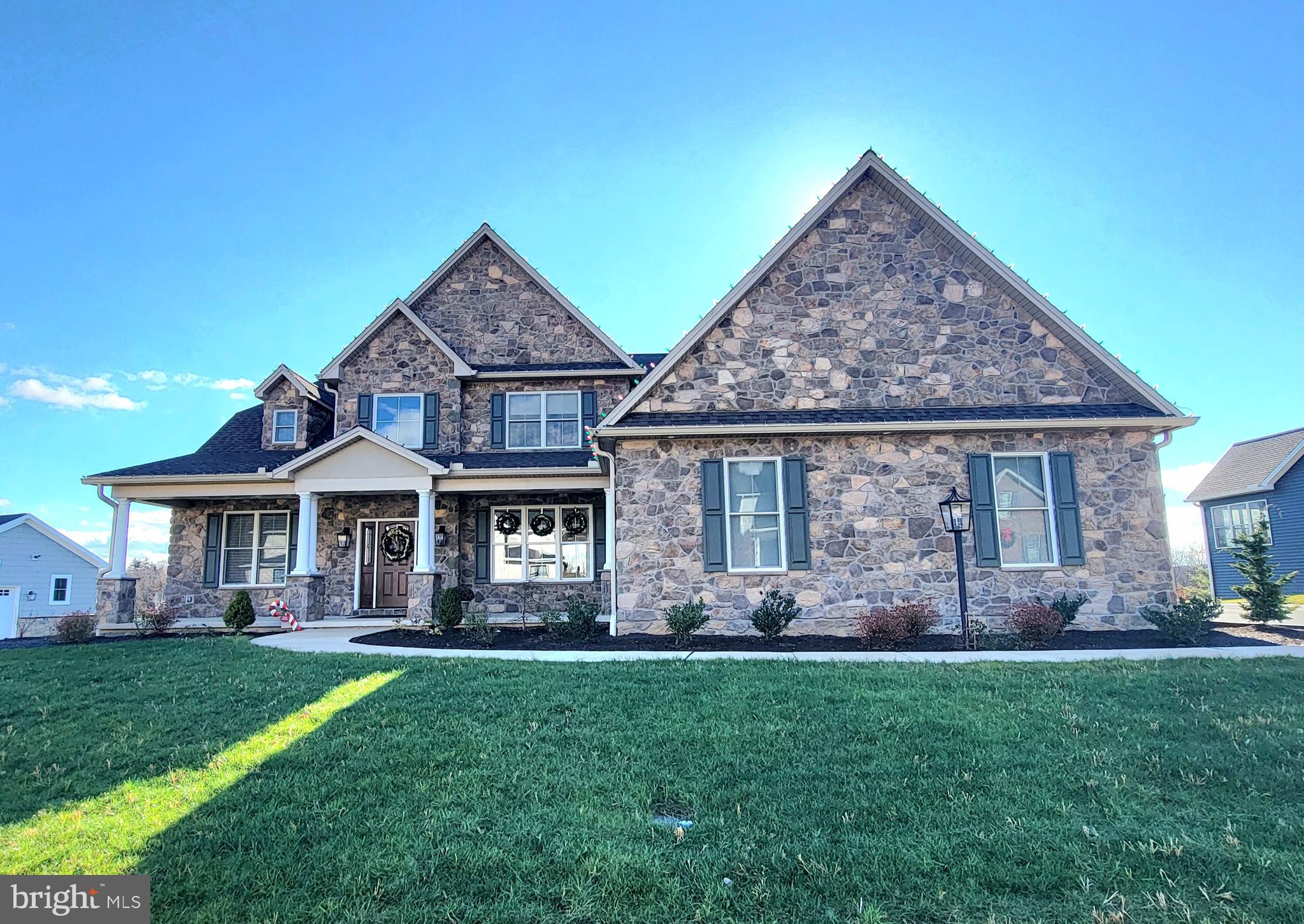 Comp purposes only. Beautiful custom. All stone surround, 1st flr primary, finished walkout basement w/ added bedroom, full bath and bar. Screened trex rear porch and deck. Geothermal system