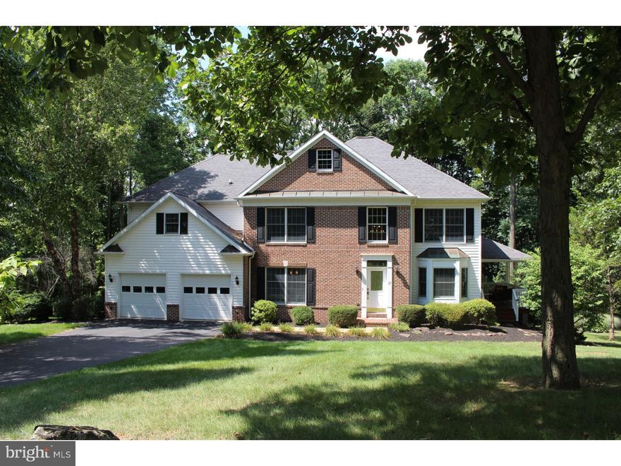 Stunning 5 Bedroom Brick Home in the desirable Kinsey Hill Development.  This spacious home offers 4515 sq. ft. and is located on a tree lined cul-de-sac street.  It offers a neighborhood setting plus privacy, since it borders on woods.  Entering the home you notice the dramatic 2-story entry with the balcony.  Split staircase leading upstairs from the front entry or kitchen.  French doors lead to the formal dining room on one side and additional french doors open to the formal living room, which is being used as an office. The magnificent custom oak kitchen will be a dream to cook in with the Corian counter tops, breakfast bar, double oven and Sub=Zero refrigerator.  Great room features a beautiful gas fireplace  with outside access via the covered side porch.  Striking scenic wooded views are visible from many locations in the house!!  The second floor boasts 4 bedrooms.  Neutral interior was just painted and completely newly carpeted throughout! Cozy up to the lovely warm fireplace in the spacious Master Bedroom as well as an additional sitting area.  The bathroom is spectacular!  Whirlpool tub...Glass shower...his and her vanities!  There are the 3 other roomy bedrooms upstairs and an additional full bath.  The finished walk-out daylight basement features the 5th bedroom and full bath, that could be used as In-Law quarters.  There's a large recreation room and wet bar.  Seller will transfer the AHS Warranty that is currently on the house.  Also includes a lovely large deck and back yard for family fun and entertaining. Convenient location to shopping, schools and recreation!  Easy access to Rt.422, 176 minutes from the PA Turnpike with points traveling to Chester, Montgomery and Lancaster Counties.  This home has many wonderful, quality upgrades!! Please schedule a showing and come see for yourself!!