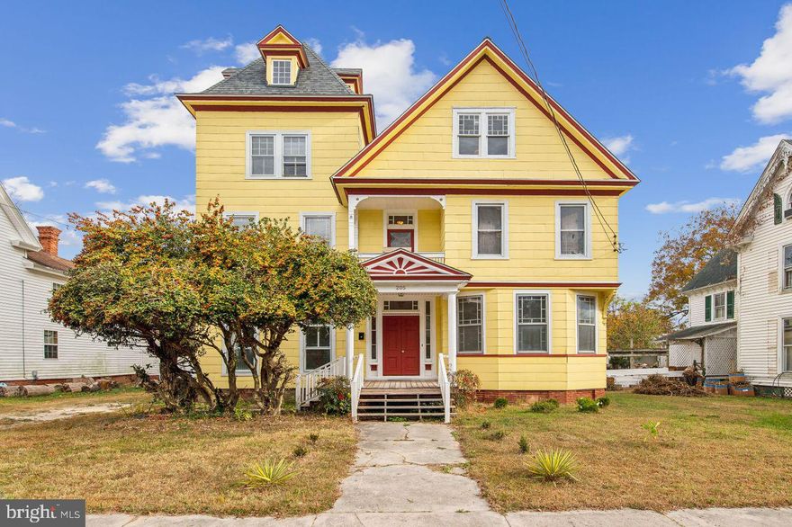 Welcome to 205 Walnut St, a beautifully restored historic home in Pocomoke City, MD. Built in 1891, this expansive property spans over 3,400 square feet and effortlessly combines classic charm with modern updates. Located just a few blocks from downtown, the scenic Pocomoke River, and surrounded by beautiful Victorian homes, this property offers a prime location with a short travel to Walmart, Lowe’s, restaurants, and shopping. Entering through the covered front porch, the foyer opens to a grand parlor on the right, featuring large colonial-style windows, intricate trim work, and refinished hardwood floors. On the left, a spacious family room mimics the dining room, showcasing oversized windows and restored hardwood flooring, creating an inviting atmosphere ideal for gatherings. The fully updated kitchen is a chef’s dream, complete with new luxury vinyl plank (LVP) flooring, abundant new hardwood cabinetry, new stainless steel appliances, and a large sit-in island. Quartz countertops, recessed lighting, and a recessed refrigerator add sophistication and functionality. A full bathroom on the main level features a tiled stand-up shower and provides interior access to the basement. The refinished hardwood staircase leads to the second floor, where the primary suite awaits with a large primary bathroom, including a tiled stand-up shower, a luxurious jetted tub, and LVP flooring. Two additional spacious bedrooms and another full bathroom with a tub/shower combo complete this floor. A small balcony offers a charming outdoor retreat. On the third floor, two versatile bonus rooms are perfect for use as a game room, study, or playroom, along with two more large bedrooms. One of these bedrooms includes stairs leading to the crows nest/attic with 360-degree windows, creating a unique space with panoramic views. Outside, a covered back porch with recessed lighting provides an ideal spot for relaxation or entertaining. Upgrades throughout the property include two dual-zoned heat pumps, a 200-amp main panel unit, a gas tankless water heater, new wiring in the kitchen, recessed lighting, ceiling fans, refinished hardwood flooring, new LVP flooring, fresh interior and exterior paint, new  roof with architectural shingles, kitchen cabinets and countertops, appliances, and updated tile work in the bathrooms. The original oil furnace has also been retained as a backup or supplemental heat source. This extraordinary property at 205 Walnut St offers a rare opportunity to own a piece of history with the conveniences of modern living.