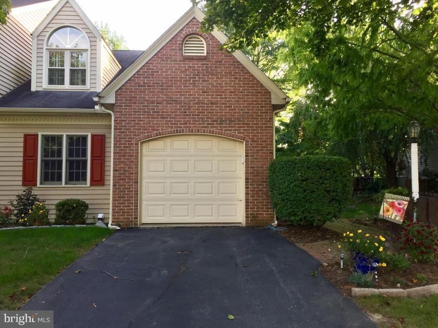 This wonderful end unit townhouse features a beautiful fireplace in living room with cathedral ceiling, first floor bedroom and full bath on both floors, finished lower level with tons of closet space, sunroom off living room and patio area for outside entertaining.  All new updated kitchen, new HVAC system with duct work cleaned, newer windows in upstairs bathroom and bedroom, plus all appliances are new and stay!Enjoy carefree living in this townhouse with HOA that covers snow, mow, exterior maintenance and trash.