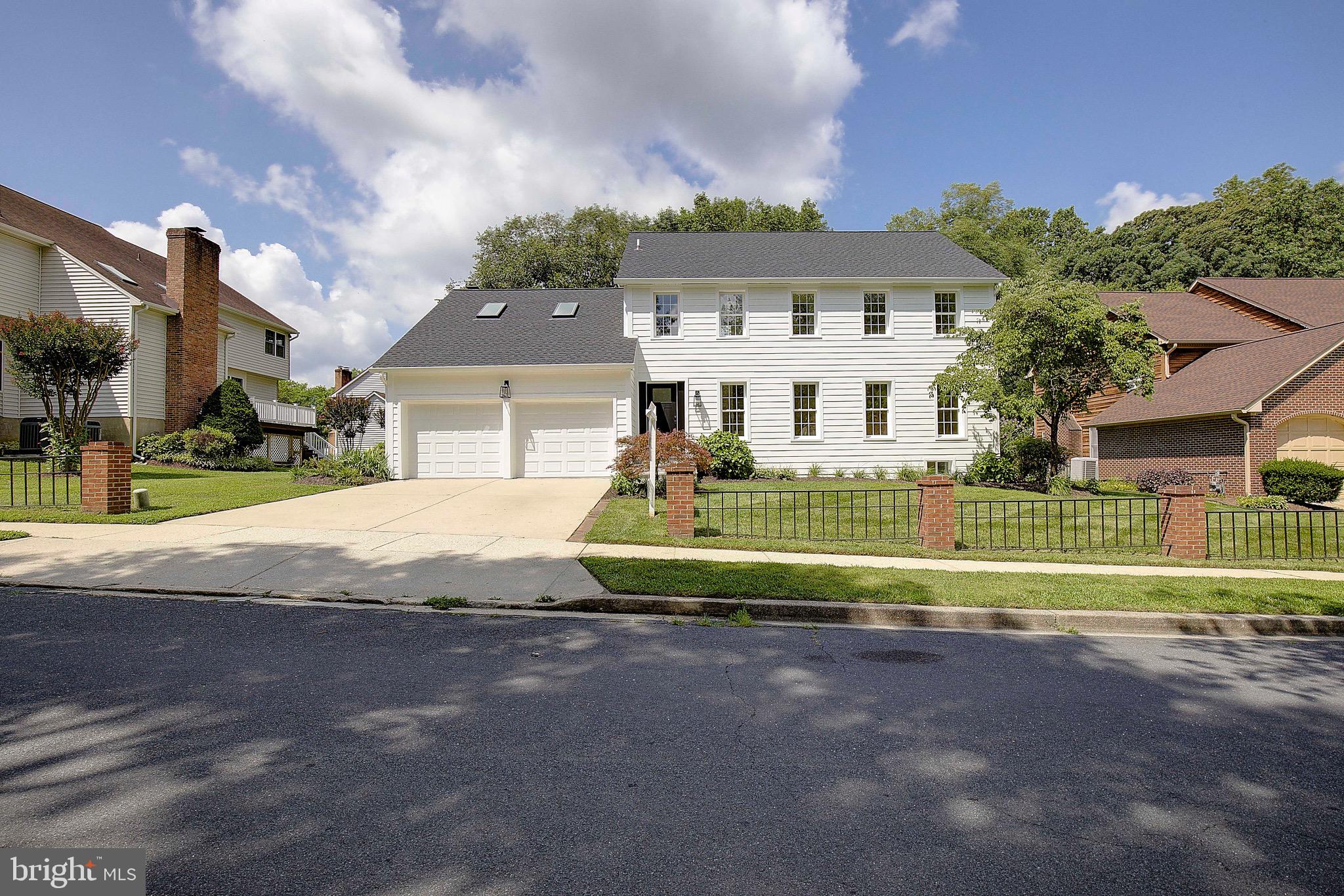 Stunning fully remodeled home in the heart of Crofton! Located just off Crofton Parkway, this stunning colonial features 5 bedrooms (2 Master Suites), 4.5 fully remodeled bathrooms with some of the most elegant finishes in the entire zip code, and offers 4,300 sq ft of living space! The home boasts a new roof (with new gutters and downspouts) new front siding, and sits on a generous sized lot with a clear, flat backyard. Inside, the entire home features brand new flooring (and carpet) throughout, a stunning kitchen with white solid wood cabinets, stunning quartz counters, and high end finishes and appliances. The walk-up basement consists of a beautiful wet bar, an extra room, a theatre room, a full bathroom, and a large open layout. Even the garage has been updated, with fully finished and painted walls, brand new garage doors, tracks, and motors. The home also features 2 separate laundry rooms! This home is among the finest homes in Crofton, and one you will want to see!
