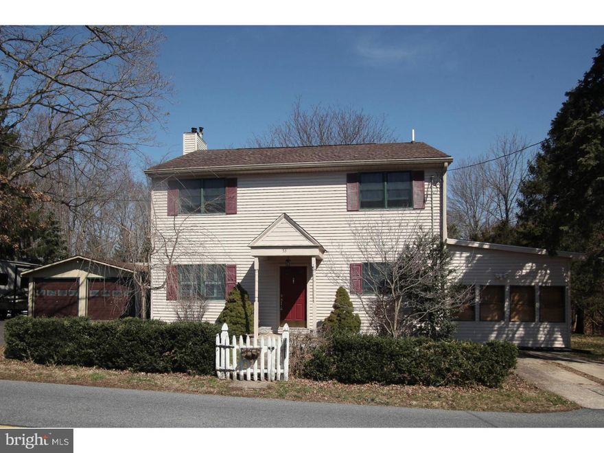 Beautifully wooded grounds in a park-like setting.  This 5 Bedroom, 2 Bath Colonial Farmhouse styled home exudes character. Original house was completely added onto and gently restored in 2002. A main floor Bedroom is the perfect spot for an in-law or nanny. Updated and cozy, this cherry kitchen features wood cabinetry, gas range, microwave, dw and corian counter-tops. Beautiful Hardwood flooring is featured t/o the first floor. A first floor office is conveniently located in the front of the house. Be comfy-cozy by the Fireplace in the Large Living room with built-in's and view of the beautiful gardens and grounds. A generous sized DR features gleaming HW flooring. A light filled sun-room is the perfect spot to enjoy a tranquil morning watching the sunrise as you sip coffee and begin your day. The second floor (newer addition) features 4 good sized bedrooms all with generous sized closets. One room features a walk-out balcony. Detached 2 car garage with additional parking. The perfect get-away, your own backyard retreat surrounded by towering trees and a babbling brook. Truly move-in condition. Unique when the ordinary won't do! BRING OFFER!! PRICED TO SELL!!!