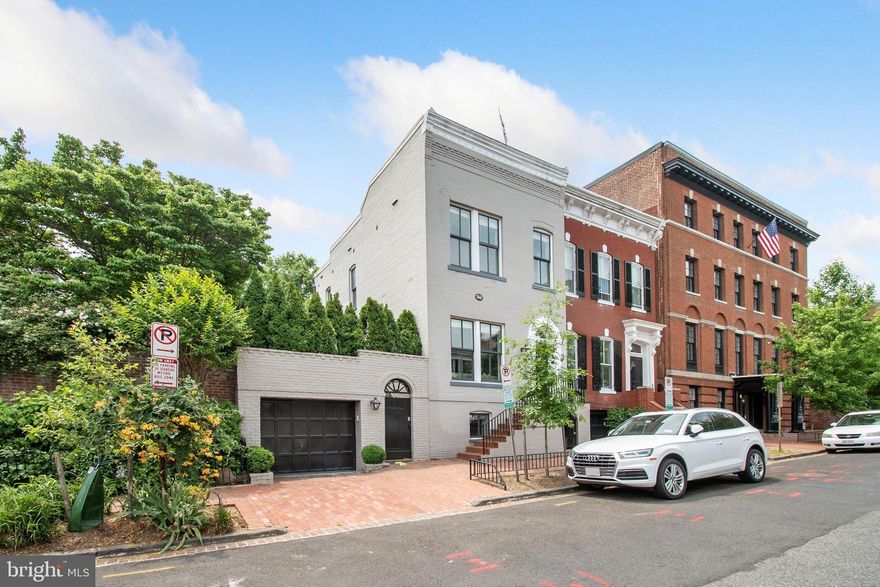 Stunning semi-detached, sun-filled, renovated home in Georgetown's East Village! Kitchen offers updated appliances, modern gas fireplace, and french doors leading to spacious garden. One-car garage parking, fully finished lower level living space. Modern finishes, in-ceiling speakers, throughout the home.