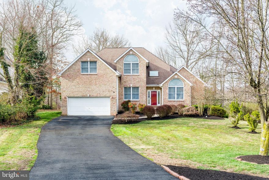 This custom built colonial offers an open layout and a spacious two-story family room with hardwood flooring, a gas fireplace and many large windows that offer lots of natural light. The gourmet kitchen features 42" cabinets, granite counters, pantry and a wet bar. The kitchen leads to the covered screened porch that will make a great space for entertaining. The main level features an office or living room with doors that offer privacy, a formal dining room and an owners suite with a private bath with soaking tub, custom tiled shower, walk-in closet and direct access to the deck overlooking  the tree lined rear yard. The upper level offers 3 spacious bedrooms and a full hall bath. The two-car garage leads to the laundry/mud room. The full basement could easily be used for additional living space and offers direct access to rear yard and a full bath rough in. Enjoy the convenience of great local restaurants and shops in downtown North East, minutes from marinas and close to major commuter routes. Schedule your showing today.