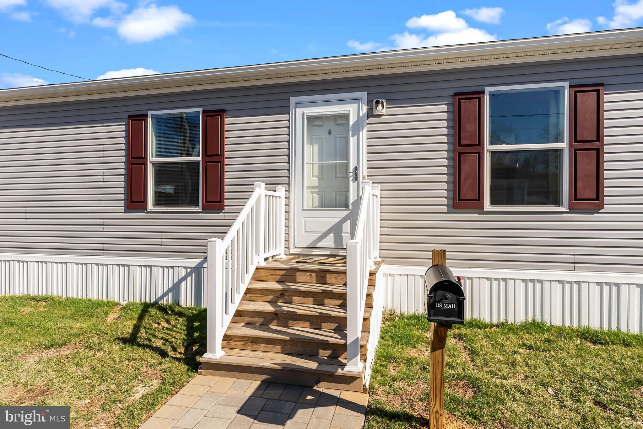 Welcome to 3429 Azalea Ave, a beautifully maintained mobile home built in 2022 that feels practically brand new. With 2 spacious bedrooms and 2 full bathrooms—including a private en-suite in the master bedroom—this home offers modern comfort in a clean, open layout. Step through the front door into a bright, open-concept living room that flows seamlessly into a stunning kitchen, perfect for both everyday living and entertaining. The home features newer storm doors and a newer washer and dryer, adding peace of mind and convenience. Down the hall, you’ll find a private laundry room with direct access to the backyard—ideal for easy, functional living. Each room in the home is generously sized, and the overall space feels fresh, airy, and barely lived in. Don't miss out on this opportunity for low-maintenance, easy living in a like-new home. Monthly fee of $840 includes water, sewer and trash. Schedule your tour today!
