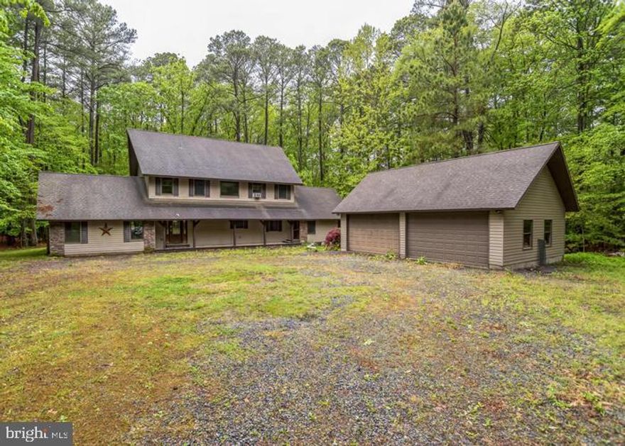 Built in 1994, this two story home offers approximately 2724 finished square feet, four bedrooms, two full and one half bath, vaulted ceiling, fireplace, covered front porch, rear patio and detached four car garage. This home sits on an approximate 311585 sqft lot (7.15 acres).