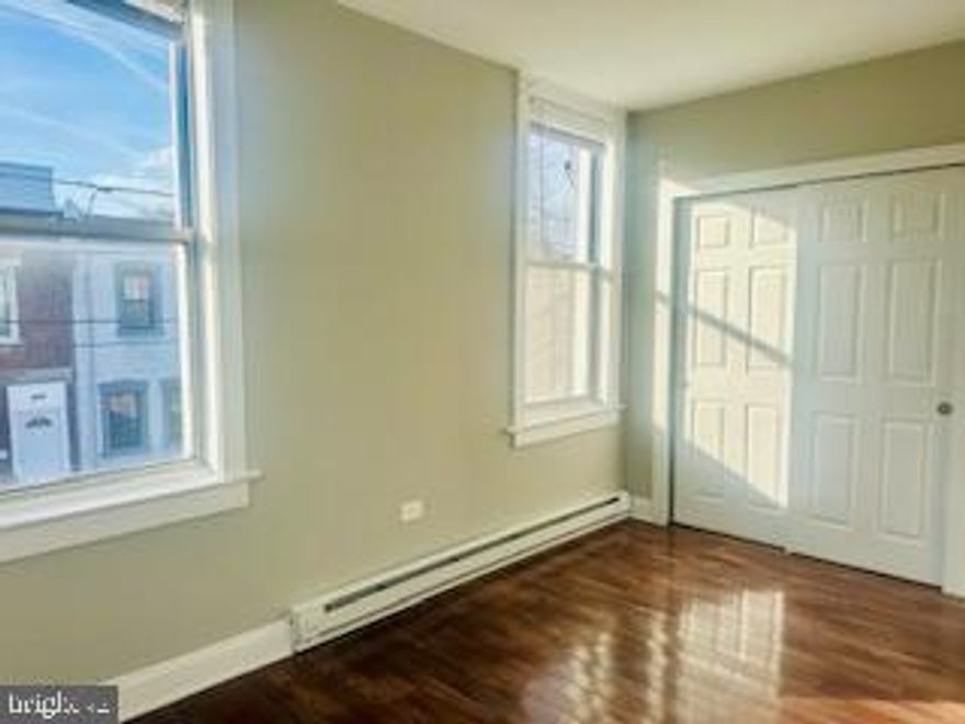 A spacious two-bedroom corner unit is now available in Point Breeze, near Wharton Square Park. The bright corner unit at 1413 S 23rd Street features two generously sized bedrooms, one full bathroom, a spacious kitchen, and a large private deck—perfect for relaxing! Rent is $1650 per month, and a garage is also available for an additional $100. Move-in ready! Schedule a showing today. 
(The first-floor commercial unit is also available to rent for $1750! )