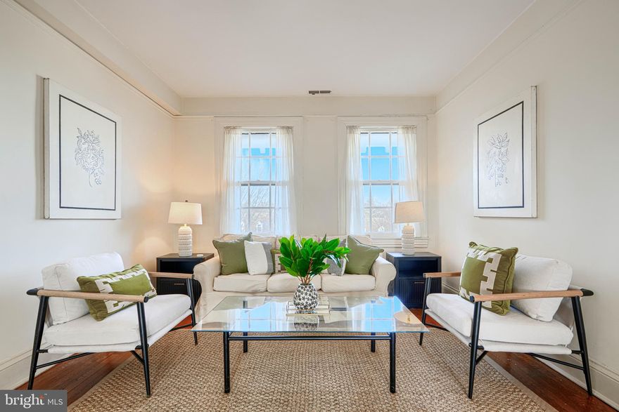 Location is everything! Here we are in desirable Roland Park. So much charm, sunny and bright unit. This fabulous two bedroom, Jack n' Jill bath condominium is move-in ready! One of the bedooms has a cute balcony perfect for sipping coffee in the morning and enjoying a refreshing beverage in the evening. You also have a one-car garage that can be used for additional storage. Enjoy the Oak hardwood flooring in the living room and dining room and Georgia Pine flooring with a lovely cherry stain in both bedrooms. A high-end, stackable Miele washer/dryer in the kitchen completes the picture. Updates include newer HVAC (2 years), hot water  heater 1 year or so old, and the roof although a community expense, was replaced 6 years ago. Yes! Fun fact - the building was designed by Clyde Nelson Friz, who designed the Enoch Pratt Library downtown! Here life is so convenient & fun. It’s just a short walk to Wyman Park, Stony Run Park, Johns Hopkins University, the Baltimore Museum of Art, the Rotunda Shopping Centre or Hampden’s “Avenue." So many services, boutiques, supermarkets, restaurants and cafes are just a stroll away. This home, along with its locale, is one to be savored.