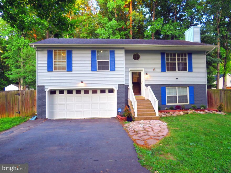 Open House July 24 & 25 12:00 Noon-3:00pm. It’s a wonderful day in the neighborhood and 23 Meadowood Drive could be your home in a Cul-de-sac community! Meadowood  Village subdivision is a Peaceful and Private Place to call home. Three bedrooms and 2 bathrooms are on the main level,1 bathroom is located on the lower level.  The lower level features a Laundry room,  flexible space that can be used as a multimedia game room or multipurpose great room. An additional bonus room could be your home office or study room.  It's your season create it to fit your lifestyle!  Kitchen with backsplash on main floor brand new kitchen appliances with manuals! Fireplace in the living area. Laminate flooring and carpet.  Privacy fence and gates on both sides leading to the huge fenced-in backyard.  Mature trees awaiting for your hammock to relax and enjoy outdoor living and entertaining.  Enjoy while bird watching and butterflies passing.  New Flooring of deck large enough for several conversations overlooking back yard for entertaining and privacy.  Huge shed to add your work table and chairs, exercise equipment, crafts and storage space!  Built-in customized wooden shelves to place all outdoor equipment for your lifestyle in Peace! Must see! New Paint interior, exterior power washed. Wired ADT. The lower level features a flexible space that can be used as a multimedia game room!    Peek in the door (2 vehicles)  to see what a great garage with a  new garage door and windows including 2 remotes so you can drive into the garage to stay in for a pleasant evening at home! Additional Refrigerator located in garage conveys with the sale. One year Home warranty included in sale.   Huge driveway additional to oversized 2 car garage.  Reminder: Enjoy side entrance to the yard through private gate entrances or Sliding glass doors on lower level leading to side herb and vegetable garden leading to flat back yard with beautiful trees for sun and shade awaiting your hammock to share with family and friends!  Additional Sliding glass doors in the dining area leading to a great huge deck to entertain your family and guest or a quiet evening of rest while counting stars and listening to crickets of the evening.  Location minutes away from the commuter lot, VRE train stop!  Hwy 95 north and south and historical Hwy 1, restaurants, local grocery markets and retail shopping, local winery, parks, and water activities in the sun! It’s your season,  don’t miss the moment!
