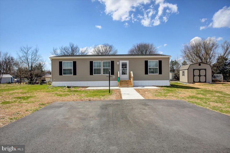 Step into this stunning 3-bedroom, 2-bathroom 2025 CHAMP home, multiple upgrades. Just to name a few, it features a high efficiency furnace, back splash, farm sink, all vinyl flooring throughout and all walls are drywalled! This practically brand-new home comes with a transferable 7-year structural warranty. It is absolutely gorgeous, move-in ready and waiting just for you!!! Ask your agent about financing.  Ground rent is only $350 per month and includes sewer & trash. Lastly, you must obtain park approval.