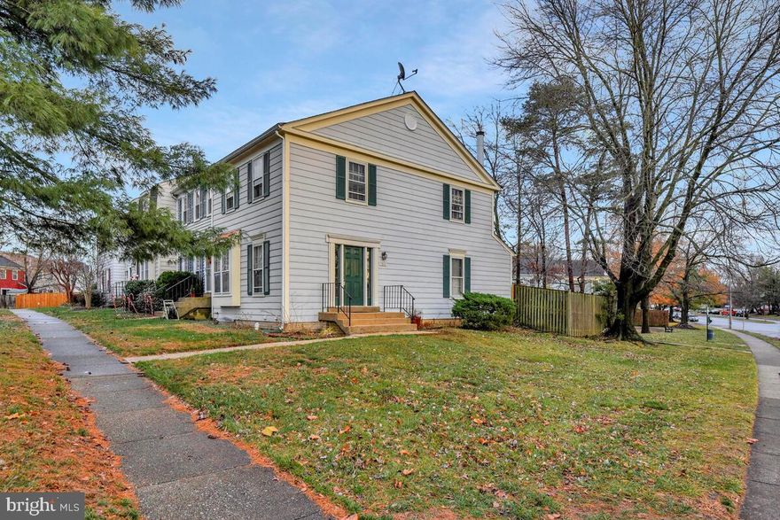 Beautifully updated, light-filled end-unit townhome in a wonderful community! This well-maintained property features brand-new carpet, fresh interior paint, and newly updated countertops. The main level offers hardwood floors and an open layout with great natural light throughout. The second level includes a spacious den—perfect for a home office, playroom, or extra lounge area. Enjoy outdoor living on the large rear deck, ideal for relaxing or entertaining.

The community pool is conveniently located right across the street, and the neighborhood offers an abundance of parking and a friendly, well-kept atmosphere. Truly a move-in-ready home in a fantastic location!