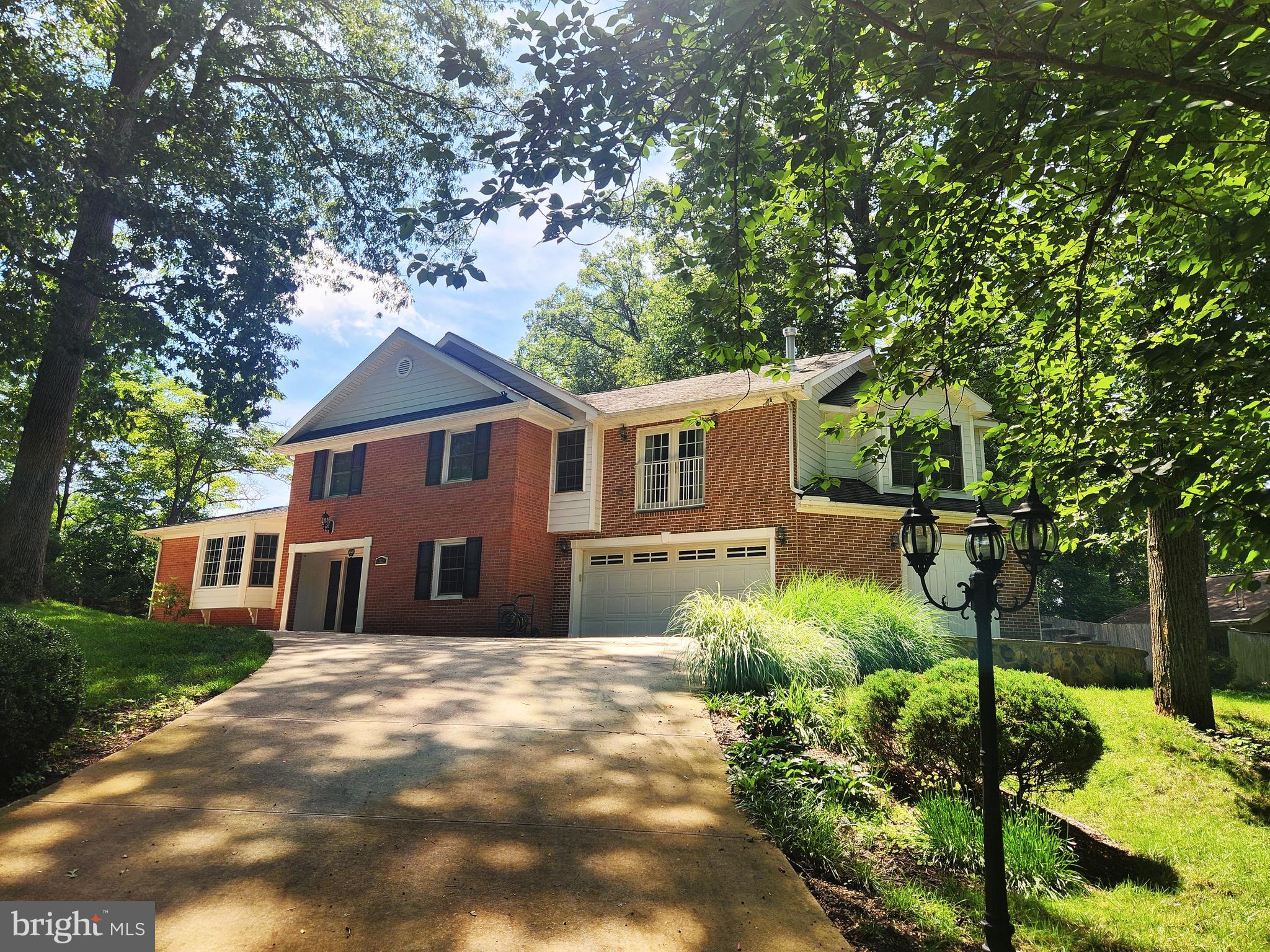 What a wonderful place to call home! This lovely 5BR house is located in the sought after neighborhood of Springbrook. The tranquility of mature landscaping with the sound of birds singing, make this a great place to relax and settle down after a long day.
Enter this home with gleaming hardwood flooring and a bright and airy atmosphere.
Enter the gourmet kitchen located right off of the family room. It features, stainless steel appliances, access to the backyard patio, custom cabinetry, quartz countertops and more!
2+ car oversized garage has an additional nook specifically added for motorcycles but also is a perfect place to store bicycles or mopeds. Added for your convenience is a Tesla EV charger.
The garage and interior both lead to a separate 1BR in-law suite featuring an additional living room w/fireplace, full kitchen, W/D, full bath and private balcony with a beautiful backyard view.
The Primary bedroom has a wet bar or snack room, walk in closet with designer shelving and full bath.
Generator on site and water filtration system.
So much to see in this home!
