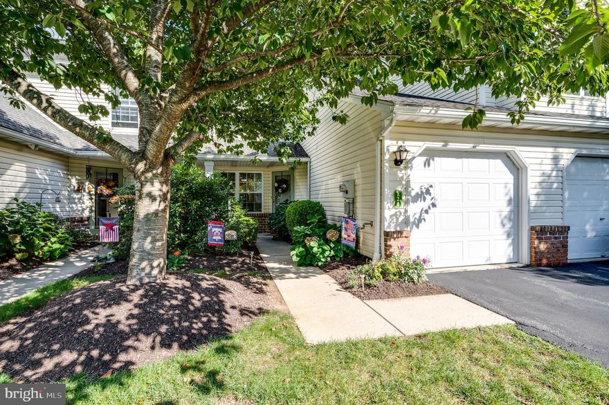 Here is your opportunity to own this gorgeous townhome offering main floor primary suite and main floor laundry in the highly sought after Spring Ridge Community! This incredible townhome offers a 1 car garage, asphalt driveway space for one additional car, rear private patio, community pool, gas fireplace, and so much more! Enter through the front door into the two-story foyer with half bathroom, laundry, and half wall to the spacious living room offering gas fireplace and luxury vinyl plank flooring. The living room is bright and spacious with an open floor plan offering separate dining area space and another half wall to the kitchen boasting granite countertops, generous pantry, electric cooking, and glass slider to the rear patio. Make your way to the primary suite with vaulted ceiling, ample closet space, and it’s very own private full bath with tile floor and walk-in shower. The second floor also offers the same gorgeous vinyl plank flooring, a large loft with closet and overlook to the foyer, a second bedroom, an additional full bath, and a large storage/utility room that also houses the gas fueled mechanicals. You will absolutely not want to miss out on this move-in ready townhome! Call today to schedule your private showing!