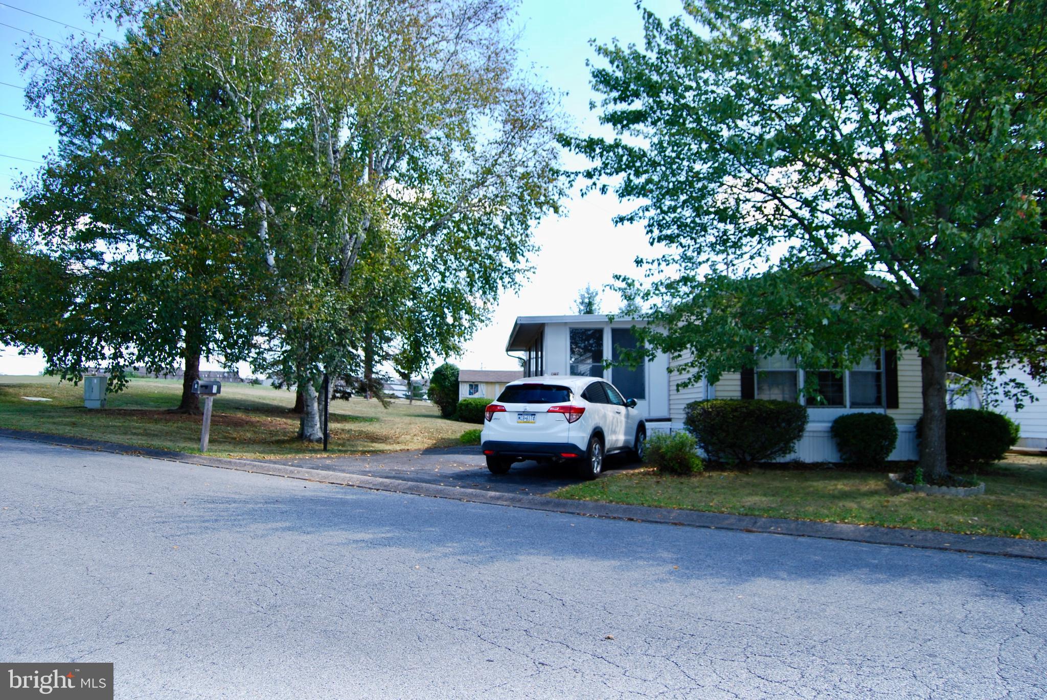Welcome to this well-maintained 2 bedroom, 1 bath mobile home located in a 55+ community in West Hanover Township. This home has been thoughtfully updated with a new roof, hot water heater and a mini split heating/ cooling system, all within the last 4 years. The bright and inviting interior offers plenty of natural light, and all appliances are included for added convenience. Relax on the spacious screened-in porch while enjoying peaceful views of the open green space. A storage shed is also included, providing extra space for your needs. Conveniently located to major highways, hospitals, restaurants and shopping. Don't miss this charming home in a quiet, welcoming community!
Please remove your shoes OR wear the shoe booties which are provided at the home.