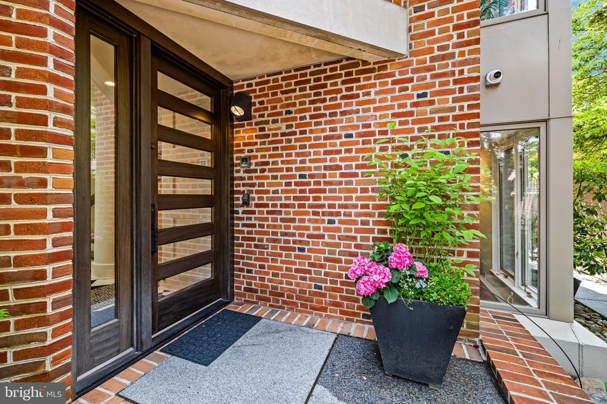 Prepare to be enchanted by this sprawling 4,200 sqft double-wide masterpiece, meticulously tailored to epitomize luxury living on a unique cobblestone block in Society Hill. Nestled within a secluded garden oasis behind ornate gates, 130-132 Delancey St boasts 4 bedrooms, including a breathtaking owner’s suite, along with 4 full bathrooms, 2 powder rooms, and an array of grand living spaces perfect for hosting soirées of the highest caliber.

Step into the majestic marble foyer, with natural light pouring in from a celestial skylight, and marvel at the intricate details at every turn. The dining room, resplendent with polished wood floors and a magnificent wood-burning fireplace, seamlessly flows into a gourmet kitchen adorned with Cesar stone countertops, a marble backsplash, and top-of-the-line appliances from Azko, Subzero, and Wolf.

Ascend to the upper levels and discover a haven of relaxation and indulgence. The expansive living area, adorned with rich wood floors and illuminated by an abundance of windows, sets the stage for lavish gatherings, complete with a colossal all-tile fireplace and a bespoke wet bar. Retreat to the opulent bedrooms, each featuring gas-burning fireplaces, sumptuous baths, and custom touches throughout.

The crowning jewel awaits on the uppermost floor, where the owner's suite reigns supreme. Bask in the serenity of vaulted ceilings and soak in the warmth of a towering stone fireplace before indulging in the spa-like ensuite bath, featuring heated floors, a soaking tub, and a cascading waterfall shower enveloped in Koehler fixtures and bathed in natural light from a skylight above.

Descending to the lower level reveals a front bedroom suite, a convenient laundry room, and a generously proportioned open area ripe for a variety of purposes—whether it be a cozy family retreat, a state-of-the-art home office, or a personalized home gym, the possibilities are endless, limited only by your imagination!

With every modern convenience at your fingertips, from built-in cabinetry to a laundry chute, this residence transcends the ordinary to deliver a lifestyle of unparalleled luxury. Impeccably renovated by a renowned custom builder, this home stands as a testament to timeless elegance and impeccable craftsmanship. Nestled in the historic Society Hill neighborhood, a stone's throw from verdant parks, charming bistros, and cultural landmarks, this is a rare opportunity to experience the pinnacle of urban living in one of the most historic neighborhoods in Philadelphia.