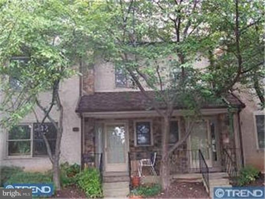This spacious Bradford Hills townhouse backs to the woods and trail.Hardwood floors in most rooms,  First floor offers a large kitchen with breakfast room, dining area and livingroom, powder room and sliders to deck. Lower level has a large l shaped room with fireplace and outside entrance to Patio plus plenty of storage. Upper level has large main bedroom with walk i closet and bath with seperate shower and tub. Laundry closet in hall , then two bedrooms and a hall bath. 4th level has a large bedroom with walk in closet. Convenient location, short drive to King of Prussia and to trains to the city. all appliances in kitchen are new stainless. Entire house was just painted. New carpet in lower level familyroom