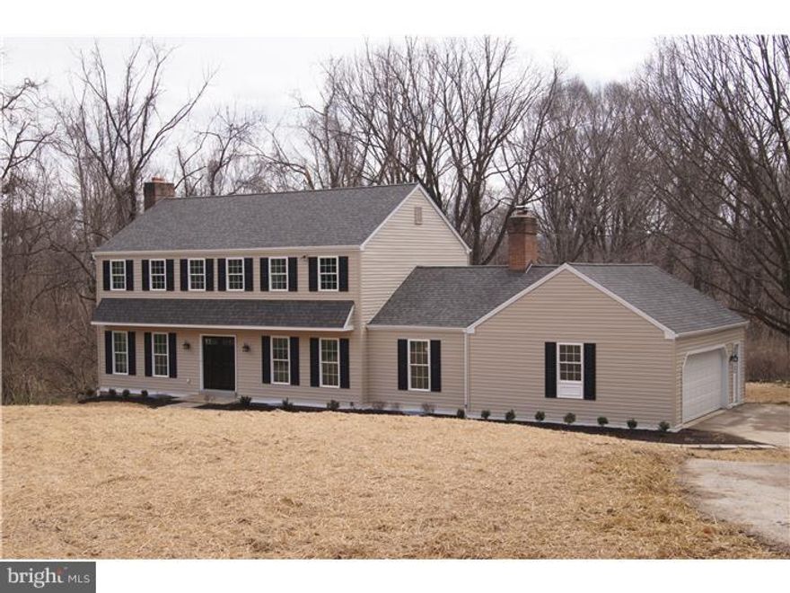This 4 Bedroom, 2-1/2 Bath Colonial on a beautiful 1.8 acres property with lovely spring fed creek in Tredyffrin Township has been professionally renovated from top to bottom.  Updated include new roof, new vinyl siding, new windows and sliding glass doors, new eat in kitchen with site finished hardwood floors, stainless steel appliances and granite counters, new master bathroom, new hall bathroom, new powder room, new and refinished hardwood floors, professionally finished basement with sliding glass door walkout to slate patio, new deck, new garage doors and garage door openers and much more.  Features include beamed ceiling in the family room, fireplaces in both living room and family room, walk in closet and private bathroom in the master bedroom, oversized two car side load garage with garage door openers. You won't want to miss this home.