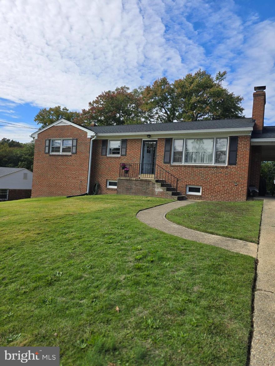 This Charming Home has 4 bedrooms, eat in kitchen, formal dinning room, three bathrooms to include an half bath on suite in Primary bedroom. Livingroom offers a pellet fireplace and Gleaming hardwood floors throughout the  main level. Kitchen has black and stainless steel appliances. Oversized dinning room that leads to exit to car port and separate main level exit to backyard. Back Yard is large and ready for family gatherings. All four bedrooms are large with great room. Basement offers one pellet  fireplace and large open family room with a large bedroom. Basement has a full updated  bathroom with stand in shower. Lets talk about storge space. This basement offer a very large storage space. This space could offer great business or family storage. Step outside to a large, fenced backyard .The back Yard has a brick grill ready for fun and cookouts. All bathrooms have been updated. Basement offers a walkout to back yard .