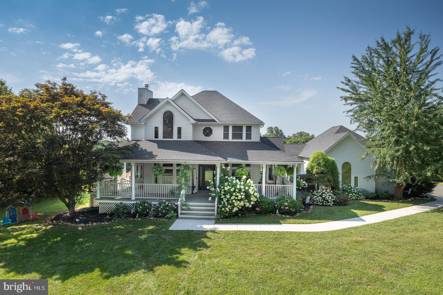 Dreaming of space to roam and a home full of character? This charming gem in Jarrettsville sits on 2 lovely acres and has personality to spare. The storybook wrap-around porch beckons you *** Inside, you'll find a main-level primary suite, a dramatic two-story family room with soaring ceilings, a cozy fireplace, and a stunning oak staircase that’s straight out of a fairytale. The kitchen is ready for pancakes and late-night snacks and there’s a formal dining room perfect for holiday feasts. A powder room and mudroom keep things practical *** Upstairs, two bedrooms share a Jack-and-Jill bath, while the newly renovated basement adds even more space with 4th bedroom with en-suite bath, bonus spaces and loads of storage *** A huge back deck for summer BBQs overlooks rolling acres with peaceful views. The above ground pool offers an oasis for summertime fun! An oversized 3-car garage includes a massive loft above. This one is a must-see!