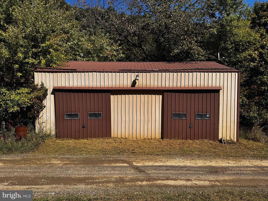 2 ADJOINING TRACTS OF LAND EQUALLING .93/ACRE.  40 X 24 GARAGE ON .32/ACRE WITH CONCRETE FLOORS, (2) 10 X 10 METAL SLIDING GARAGE DOORS, METAL ROOF, 100’ OF ROAD FRONTAGE, ALL TOOLS/TOOL BOXES INCLUDED, OLDER ATV, OLD BOAT, (2) OLD CARS AND PERSONAL PROPERTY CONVEY.  SECOND .61 ACRE TRACT OFFERS NEW 20 X 12 SHED, MOBILE HOME SITE READY TO GO.  ALL UTILITIES ON SITE, PRIVATE SETTING AND UNRESTRICTED!!!!  UNLIMITED POTENTIAL….. BUSINESS OPPORTUNITY AND HOME SITE!