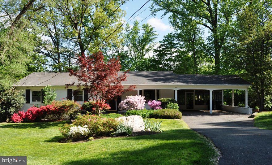 2 level rambler in the heart of Mantua. Over 2,500 finished square feet.  Updated throughout with newer kitchen 2017- Cherry Cabinets and granite countertops. New roof and gutters 2021. New hall bath 2021 and lower level bath 2022. Primary suite bath also renovated in last 5 years.   Hardwood floors on main level.  Living room with fireplace and sliding glass door to balcony- perfect setting for your morning coffee.  Lower level has a huge rec room, 4 th bedroom and full bath.  Laundry room and a shelved storage area.  Rec room has a wood burning stove and sliding glass door out to extensive outdoor entertaining space, includes deck and new stone patio (2019).  Storage shed at rear, tucked under carport.   2 space carport and screened porch off kitchen. Wonderful home for anyone that may need one level living.  Ramp around side from carport to lower level rear outdoor patio and deck.  Entered for COMP purposes.