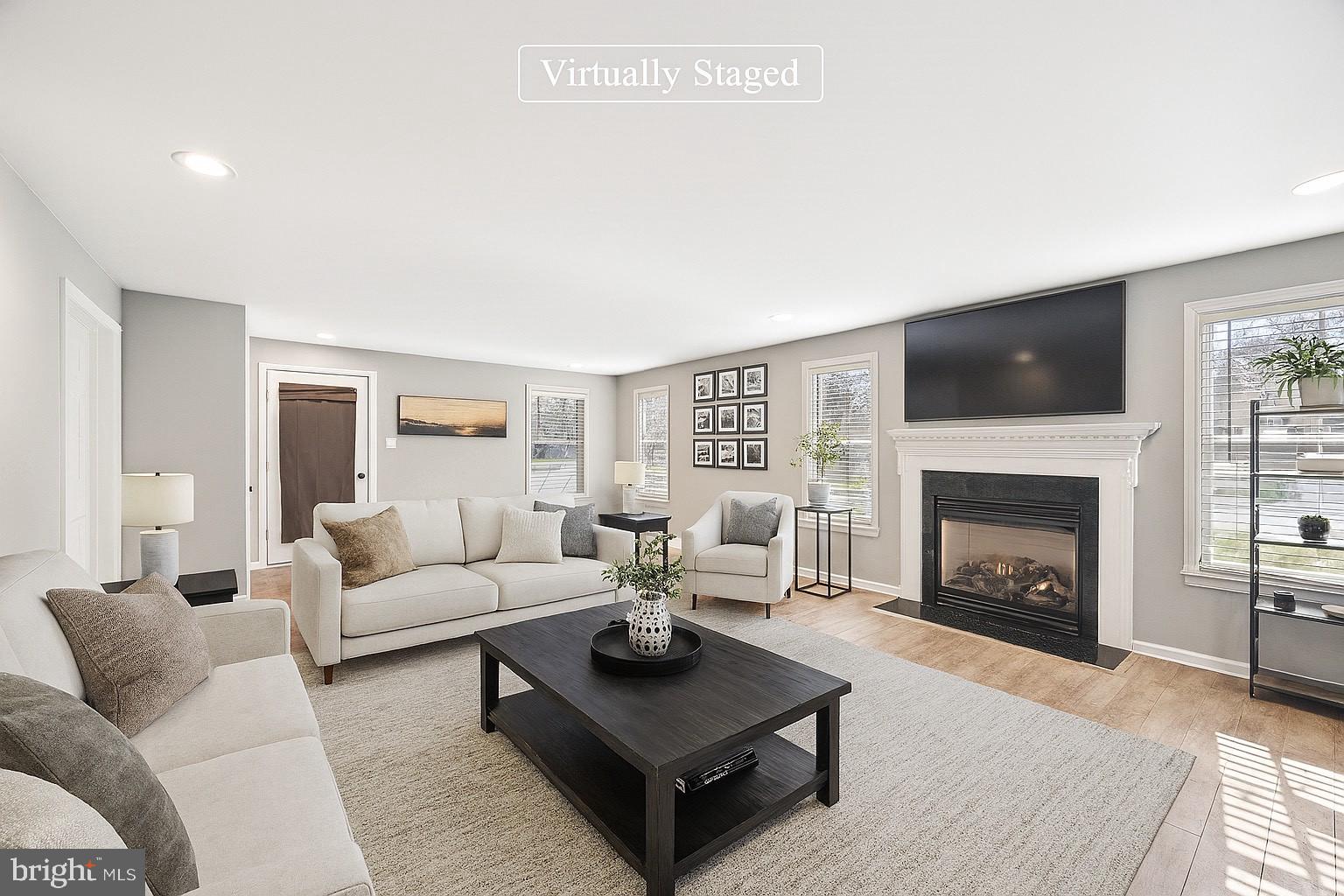 Wow! Look at this beautiful 4 bedroom, 3 full bath ,2,600 square foot beauty with a 2-car garage and endless potential! (Please note that the first 10 photos are virtually staged to help you imagine this space with a neutral design).
This home has been rebuilt from the foundation up in 2004, and this 20-year-young colonial offers so much well-designed living space. Step onto the covered front porch and into a spacious living room—envision your favorite pieces here, a cozy throw by the fireplace, and framed memories lining the walls. The recessed lighting and laminate floors set the stage for whatever style you bring. Through double doors, a versatile space currently serving as a laundry and office awaits—picture how you'd use it: a home command center, a playroom, a creative studio? Flow into the open dining room with its beautiful stairwell. Just off the side entrance, there’s a mudroom area and a stylish, fully tiled bathroom—complete with a barn-style door for that extra character. In the kitchen, the possibilities are endless! Picture the meals you'll cook surrounded by granite counters, a gas cooktop in the island, a double wall oven, and an oversized farmhouse sink. There’s plenty of cabinet space and a large pantry—think of how effortlessly your kitchen essentials would tuck away here. French doors lead to the rear deck perfect for grilling, entertaining, or sipping coffee. Upstairs are four generously sized bedrooms—each one a blank canvas. Your primary suite features a walk-in closet and a private bathroom. The three additional bedrooms offer space and plenty of closet space. Don’t forget the detached two-car garage with a finished bonus room—workshop, game room, home gym, or whatever fits your lifestyle!
Recent updates include:
Whole-perimeter French drain (2021–2022)
New sewer main to the street (2022)
Brand new roof (March 2025)
Transferable home warranty through 12/31/2028