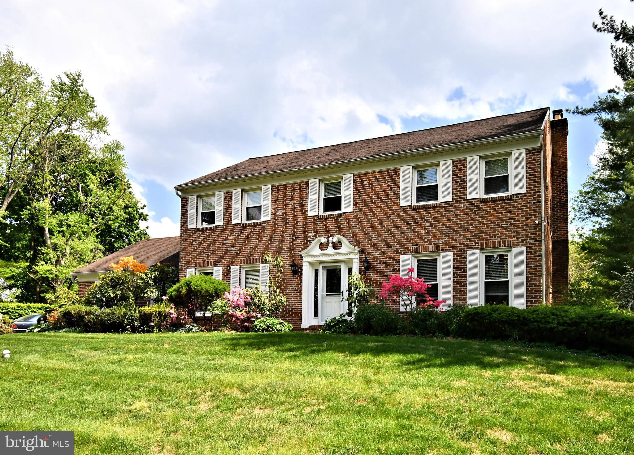 Nestled in a well-established and desirable neighborhood in Wayne, this elegant two-story Colonial offers timeless charm and numerous upgrades. Step inside the center hall foyer, flanked by a formal dining room and a spacious living room—perfect for entertaining or everyday comfort. The updated kitchen is both stylish and functional, featuring ample cabinetry, a center island with a breakfast bar, luxury vinyl plank flooring, and plenty of space for culinary creativity. Adjacent to the kitchen, the cozy family room boasts a wood burning fireplace with brick surround and built-in bookcases, with sliding doors that open to the rear yard. A convenient main floor laundry room includes a large closet, access to the two-car garage, and an additional rear entrance. Throughout the home, you’ll find beautiful hardwood floors, as well as recent mechanical updates including a newer HVAC system, hot water heater, and sump pump. Upstairs, the spacious primary bedroom offers a private en-suite bath and walk in closet. Three additional bedrooms—each with generous closet space—and a full hall bath complete the second floor. The partially finished basement provides two additional rooms, ideal for a home office, gym, or playroom, plus a utility area with ample storage. Enjoy a prime location just minutes from Valley Forge National Park, the King of Prussia Mall, major highways (Routes 202, 76, and the PA Turnpike), the Wayne Train Station, Trader Joe’s, and some of the Main Line’s finest dining and shopping. All this, plus the highly acclaimed Tredyffrin-Easttown School District. **Professional Photos Coming Sat**