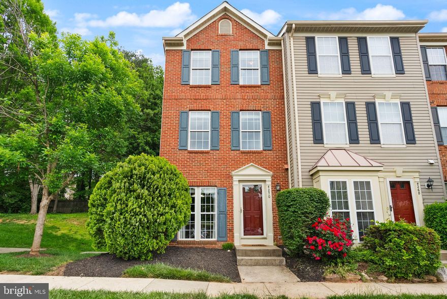 OPEN HOUSE 5/18 IS CANCELED. Bright, spacious, and thoughtfully designed, this end-unit townhome in Cedar Lakes offers the perfect blend of traditional elegance and modern comfort across three sunlit levels. Brand new roof in April 2025! Enter inside the first level living spaces, blending classic moldings and hardwood floors with a light, airy layout designed for modern living. The generous formal dining room features a bay window and updated lighting, while the updated kitchen showcases granite countertops and an island perfect for casual meals and conversation, complemented by ample all-white cabinetry and stainless steel appliances. Move outside to the shaded ground-level deck, enclosed with privacy fencing and backing to trees for a tranquil private outdoor space. A powder bath completes this level. Upstairs on the second level, hardwood floors continue in the large living room featuring a fireplace with marble surround. Sunlight filters through trees into large windows and a glass door to the balcony, perfect for outdoor entertaining and relaxation. This level also hosts a spacious bedroom and full bathroom. The third level is dedicated entirely to the primary suite, offering ultimate privacy and seclusion. Vaulted cathedral ceilings soar above a spacious bedroom and sitting area, ready to host a home office or private retreat. Enjoy the huge walk-in closet with professional organizers and a full-size window for natural light, plus an en suite bathroom with double sinks, jetted soaking tub, and separate shower. Cedar Lakes amenities include a pool, tennis court, playgrounds, and pet stations, with additional greenspace at Ox Hill Park and historical site just around the block. Located just half a mile from local restaurants, cafes, grocery stores, and theaters, this home also offers convenient access to Fairfax County Parkway, Route 50, and Route 66. Dulles airport is about 20 minutes away, with Washington, D.C. approximately 30 minutes away. This light-filled end-unit townhome offers the perfect combination of comfortable living spaces, outdoor enjoyment, and community amenities in a prime location.