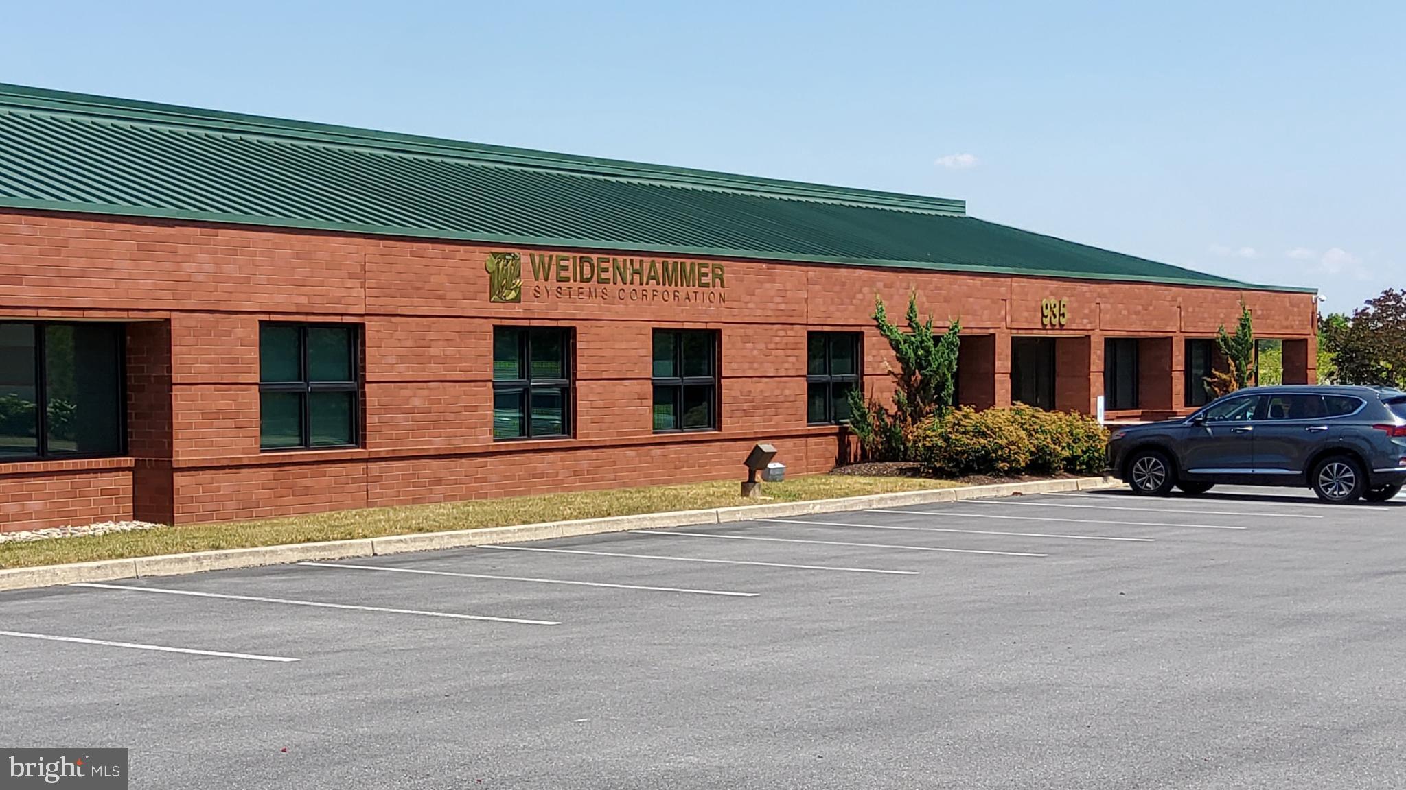 **For Sale: 935 Berkshire Blvd, Wyomissing, PA – Prime Class A Office Space**
This 20,800 square foot, single-story, Class A office building is now available for sale in the prestigious Wyomissing Corporate Center. Built to high standards in 1994, this multi-tenant property offers an exceptional opportunity for businesses seeking a professional office location in Berks County, with close proximity to other corporate offices, retail centers, and dining options.
**Property Highlights:**
- **Size:** 20,800 sq. ft. of flexible office space
- **Location:** Wyomissing Corporate Center, a prime business hub
- **Year Built:** 1994, meticulously maintained
- **Layout:** Features a large lobby with a secretarial/greeting area, an executive office suite with a private restroom, numerous private offices, several conference/training rooms, a spacious call center-style cubicle area, and a kitchenette.
- **IT Infrastructure:** Includes a dedicated IT room with raised floors, UPS with a 15 KVA load capacity, dual AC units, and telecommunications served by Tier 1 fiber optic providers such as Comcast, Verizon, and AT&T.
- **Backup Power:** The building is supported by a KOHLER 80 KVA diesel generator capable of running for 48 hours under load.
- **Parking:** 110 surface parking spaces.
- **Additional Income Potential:** The 5,000 sq. ft. West Building, currently leased for $6,180/month, provides additional income. The lease is renewable annually with 5 months' notice for termination.
Located within the highly desirable Wyomissing Borough, 935 Berkshire Blvd is part of a thriving business district. Berks County itself is a growing economic region, home to major corporations, financial institutions, and a well-established healthcare industry. This location offers easy access to highways, making it a convenient and strategic choice for any enterprise looking to expand or establish a presence in the area.
For more information, floor plans, or to schedule a viewing, contact us today. This is an outstanding opportunity to own a premier property in one of Berks County's most sought-after locations