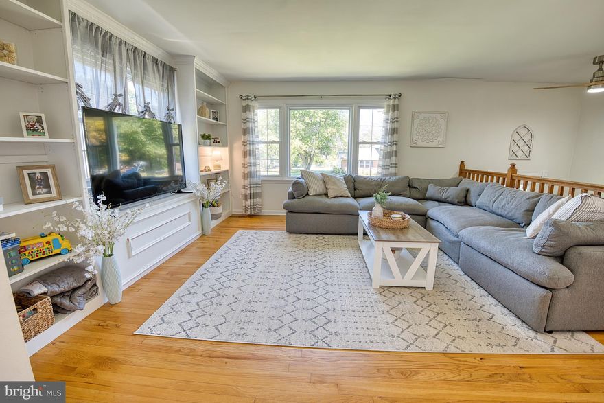 THIS PROPERTY IS NOW A SHORT SALE - Buyer to pay loss mitigation fee of $6,000.00 or 2% of the purchase price, whichever is greater, upon closing. Ready to start your eastern shore life in a quiet water access community? 205 Drovers Way in Tower Gardens is waiting for you to say, "YES TO THE ADDRESS!"  Just 1 year after falling in love with this home, life is taking the sellers back to the other side of the bridge.  Their loss is YOUR gain! The upper level features three bedrooms and 2 full baths (one bed/bath is the primary suite), sunny living room with views out to the Bay, separate dining and generously sized kitchen. Large entertaining sized deck is steps off the dining room and overlooks the 1 acre lot. Looking for a home office and multiple living spaces? We've got you covered! The lower level family room features a cozy woods stove plus there is a 4th bedroom, 3rd full bath and even a home office or fitness center. BONUS! Three car garage has inside access and is perfect for all your toys or a workshop. Tower Gardens community members enjoy their own private beach along the Chesapeake Bay, boat ramp, ball fields and tot lot for a low annual HOA fee! Move in ready for you to put your own touches on it!