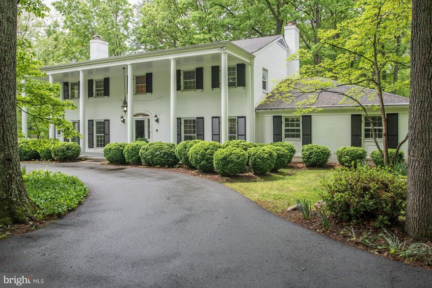 Totally renovated! Spectacular chef's kitchen. Stone patio runs length of home.  3 wooded acres. 5-car garage. 2 main level family rooms, LR-wfpl. Banquet-size DR. Oak paneled library/office off grand 2-story foyer. Master BR+BA a dream! All brand new 4 years ago! Rec Rm is WO (2nd kitchen+fpl) 2 garages attached with 34ft mud room+laundry. (2nd W/D upstairs) New wood floors on 2 levels Gorgeous !