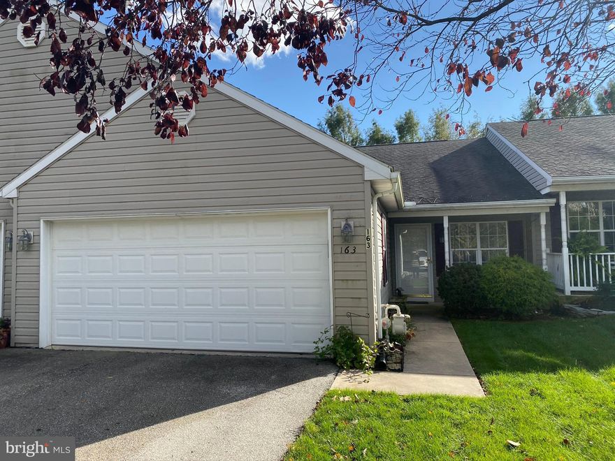 This lovely condo in Equine Meadows is the one you've waited for. Single floor living but the size of a 2 story home. Over 2000 sq ft!  1500 finished.  Crown moulding, newer flooring, Lots of room in the bright daylight, rough-ed in lower level to finish or not with walk out, rough-in for bath, and patio.   Man cave?  This condo boasts newer furnace and hot water heater and a chef style stove with center burner and convection capabilities.  There is a pull down attic with lots of floored area,  a huge 2 car garage and lots of additional  parking areas right out front!  One of the only communities that has a pool and exercise room along with community room! Friendly community with LOTs to do.  Buy now and be moved in before winter so you won't be doing the snow removal ever again. Don't miss this one!