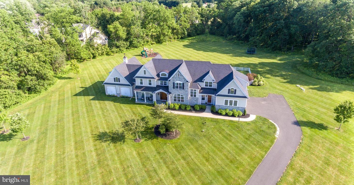 Custom build your dream home on 32.8 acres in the bucolic rolling hills of Northern Chester County. Introducing the Wharton—our most spacious model, designed for luxurious living. The open layout welcomes you with an elegant foyer, flanked by a study and a versatile flex room on one side, and a formal dining room with an optional butler’s pantry on the other.
The gourmet kitchen, complete with a pantry and breakfast room, flows seamlessly into a generous great room, perfect for entertaining. A convenient second entry leads into a spacious mudroom, with stairs that guide you to the second floor.
Retreat to the expansive owner’s suite, featuring two walk-in closets and a deluxe master bath with a soothing soaking tub. With four additional bedrooms, the Wharton provides ample space for family and guests. Plus, a thoughtfully located second-floor laundry room near the rear stairs adds to the home’s functionality.
HOUSE IS TO BE BUILT. Come to our Studio to take a look at all of the various house plans we have available. Our plans range from ranches to cape cods to two-story homes! We also offer a variety of options to make your home the dream you imagine! Call today and speak to one of our Home Experts at Studio (e)!
*Please Note: Pictures show options not included in the listed sales price or as a standard. Listing reflects price of the Wharton in the version of (e)+ series being advertised.
House Square Footage: 5,310