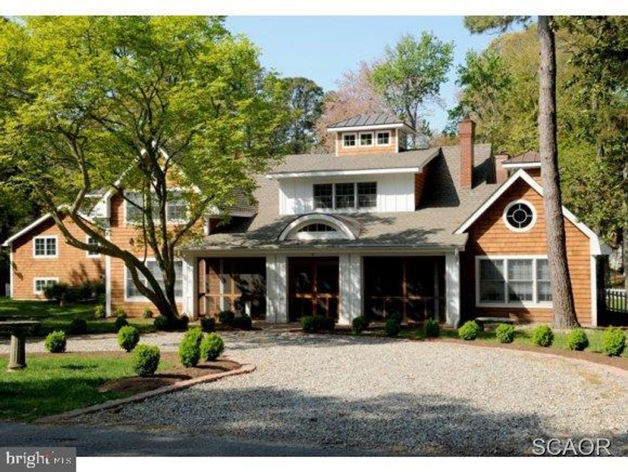 Spectacular Home In The Sought After Henlopen Acres. 5700 +/- SF Carefully Renovated To Maintain Original Charm, Yet Feature All Of Today's Luxuries. Beautiful Pecky Cypress Paneling, 4 Fireplaces, H/W Flrs, Marble Baths, Cozy Screened Porch, Carriage House & More. Large Corner Lot Perfect For Pool.
