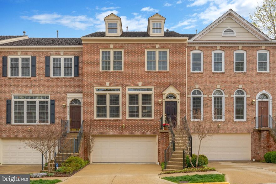 SELLER ACCEPTED A SIGHT-UNSEEN OFFER from motivated buyers.  Welcome to English Oaks, an Oakton townhouse community!  Capture the beauty of springtime from this Stanley Martin home.  The main level is bathed in natural light from the set of double transom windows.  Hardwoods enhance the spacious living room and detailed architectural moldings create a picturesque backdrop for your furnishings.  Move right in and enjoy nesting at home with the knowledge that the current owners have maintained and enhanced the home during their 12 years of ownership.  The living room opens to an intimate dining room perfect for social gatherings including holidays, special celebrations, or an all-hands-on-deck puzzle marathon on the dining room table.  Like the living room, the dining room has large transom windows with 2-inch blinds to assist in complementing the mood of the event taking place.  A well-equipped kitchen completes the main living area.  The cook of the night will find plenty of prep space with granite countertops highlighted by undercabinet lighting and SS appliances.  The chef and the sous chef can easily work together in this kitchen floorplan.  Most meals can be easily plated and served at the table space nestled by the atrium door opening to the deck.  Feeling that the weather is calling you outdoors?  Enjoy cooking on the grill and bringing the meal indoors.  Or stay outside on the newly refurbished deck (2025).  The deck features stairs to the lovely circular-design brick patio on the ground level.  The patio can also be accessed from the lower level family room.  Retire to this room after dinner or on weekends to watch your favorite movie or sporting event.  A spectacular gas fireplace which was totally revamped in 2019 is the focal point of the family room.  New LVP flooring was installed in March, 2025.  This inviting room has a full bathroom so adding a sleep sofa for guests makes this room a perfect retreat. This level also boasts a laundry closet with shelving over the washer and dryer to contain all laundry supplies.  No fear of facing a dark and dingy basement to do laundry!  If you are working on a special project in the garage, there’s a door to access the garage from the lower level.  When it’s time to turn out the lights, the upper level has an owner’s suite that will provide a welcoming place to lay your head.  The primary bedroom showcases a double window with blinds, a vaulted ceiling with lighted ceiling fan, and two walk-in closets.  The primary bathroom is prepared to provide your “Zen time” after its transformative renovation in 2017.  Two other bedrooms and a full bath complete the upper level.  The quiet, small community of English Oaks has only 85 townhouses.  It is very streamlined with sidewalks and attractive landscaping.  It is bordered by 27 majestic detached homes to complete a serene setting with everything at your doorstep.  The Oakton Shopping Center provides services (CVS, Giant, small eateries, and specialty stores) as does the downtown area of Oakton.  The Oakton library has a myriad of opportunities to increase your intellect.  The Vienna metro is moments away and exercise opportunities are available at Oakmont Rec Center.  A farmer’s market is located at Oakmont Rec Center on Wednesdays from May through October.  Don’t delay pre=scheduling your tour today.  Photos will be uploaded by end of day on Friday, April 4, along with a list of upgrades and dates of systems.