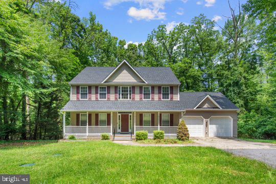 Large & luxurious Farmhouse-style Colonial with generous-size rooms situated on almost 1 acre of land. House is available immediately, has 9 foot ceilings on the first floor and is larger than it appears. Walk into the spacious 2-story foyer that's 15' long and leads to the Breakfast nook. Kitchen has newer appliances, granite countertops, and ceramic flooring. The conveniently located Laundry room on 1st floor is near the kitchen. Beautiful hardwood flooring in Family Room with fireplace. Most of the bedrooms have double closets for easy storage; primary bedroom has a walk-in closet. Includes an attached two car garage with plenty of additional space for parking and a turn-around. Lots of privacy here but minutes to the main roads and EZ commute to Annap/Balt/Wash, DC. Call LA w/questions.