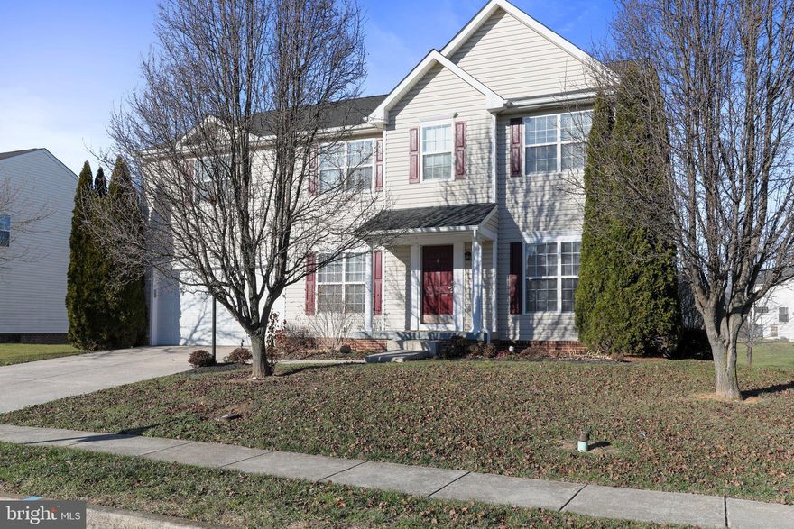 Welcome come to the largest single family home on over a quarter acre in the desirable Gallery Community in Martinsburg! This home features five bedrooms, three and a half bathrooms, spacious primary suite with ensuite full bath, and open floor plan on the main level. Cozy up to the gorgeous stone fireplace in the family room or bask in the natural light in the morning room. Tons of living space with a formal living room, formal dining room, recreation room, and a chef's kiss kitchen with double ovens, upgraded countertops, gas cooktop, and views into the dining area and living room. It doesn't stop there with the walkout basement and two car attached garage what more could you ask for? Schedule your private tour today before it's too late!