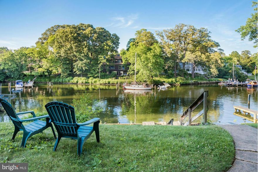 Reduced! Large waterfront Murray Hill site with small cottage on Spa Creek with great views. Complete architectural plans available to build spacious home. Bonus: Floating pier is shared. Value in the lot & house sold in "as is" condition.