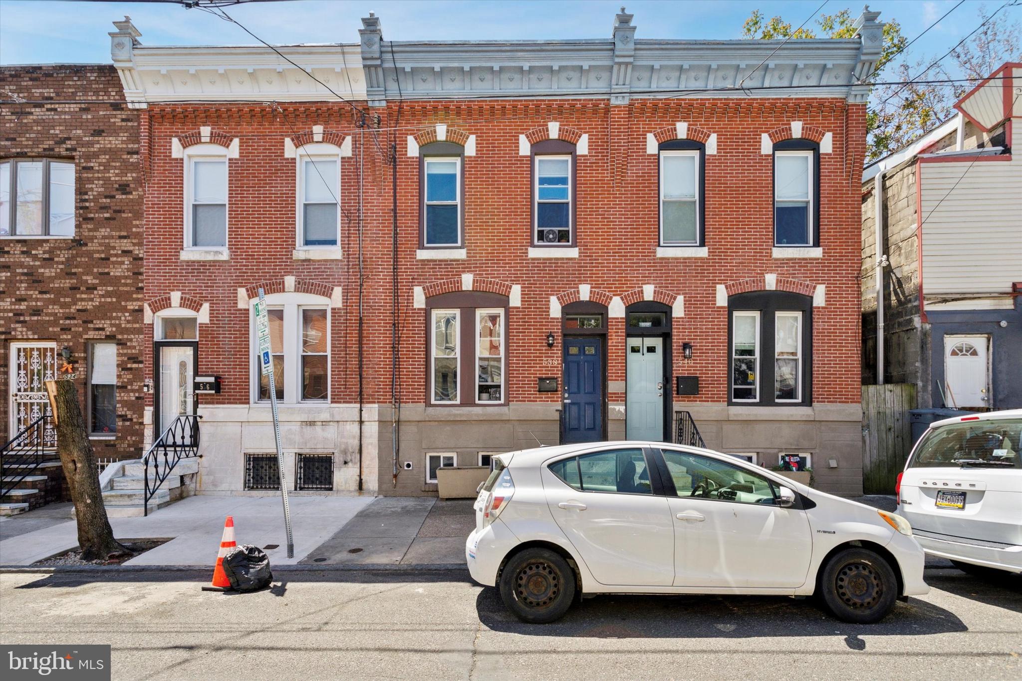 Welcome to 538 Moore Street- a beautifully renovated and maintained 3-bedroom, 2-bath home nestled in the heart of South Philadelphia's sought-after Dickinson Narrows neighborhood. This spacious home boasts a classic original brick facade with elegant arched brick detailing and original cornice, offering timeless curb appeal on a quiet, tree-lined block. But one of the best things about this block is that the lots are extremely long- so this home provides plenty of living space PLUS a giant back yard! Step inside to find a spacious open layout, with a large living room, a central kitchen and powder room, and a rear dining area that lets out onto one of the largest private yards in the neighborhood- ready to be transformed into your city oasis for entertaining, gardening, or simply relaxing outdoors. Upstairs, at the front of the house you'll find the primary bedroom with spacious en suite bathroom, along with two additional bedrooms and another full hallway bathroom. Located just steps from neighborhood favorites like Dickinson Square Park (with its Sunday farmers market, events and movie nights), the Bok Building, and an array of cafes and shops along Passyunk Avenue, this home combines space and charm with an unbeatable location. Don't miss your opportunity to own a unique piece of South Philadelphia with room to grow, both inside and out.
