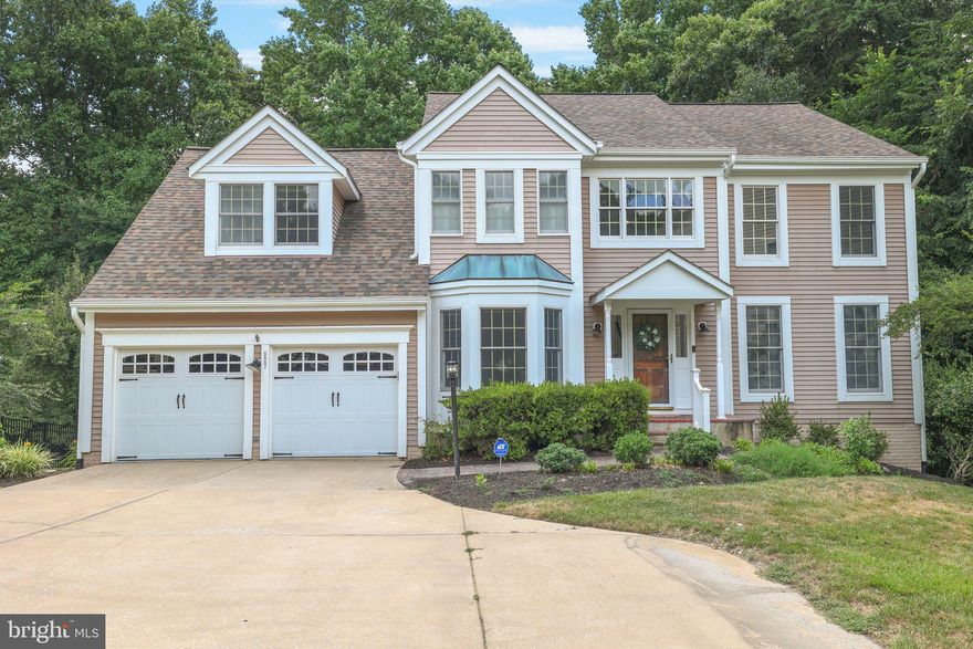 Welcome to 6882 Caravan Court in Columbia! This stunning single-family home boasts fresh paint, new carpet, and the best part is there are NO HOA OR COLUMBIA ASSOCIATIONS FEES! Tucked away in a private cul-de-sac, you'll be greeted by a spacious driveway and a beautifully landscaped yard. Step inside the covered portico and into the sun-drenched two-story foyer with gleaming hardwood floors. On your right, you'll find a study with French door entry, built-ins, and luxury vinyl plank flooring. To your left, the living and dining areas are combined, featuring sprawling luxury vinyl plank floors, crown molding, and chair rail molding. 

As you make your way into the kitchen, you'll discover a chef's dream come true. Complete with granite countertops, a center island for dining, dual-toned cabinetry, stainless steel appliances, and 42" custom cabinetry. There's also a breakfast area where you can enjoy a meal while taking in the serene vibes. 

Upstairs, the family room awaits with cathedral ceilings, a wood-burning fireplace, and two outdoor entries leading to the deck with peaceful forest views. The backyard oasis includes a patio off the walk-out basement and expansive greenery. The main level is completed by a laundry area and a half bathroom. 

Heading upstairs to the owner's suite, you'll find a luxurious retreat with gleaming hardwood floors, a sitting area, cathedral ceilings with a ceiling fan, and an ensuite bathroom with double vanities, a soaking tub, and a stand-in shower with tiled flooring. There are also three spacious secondary bedrooms with fans and a full bathroom with double vanities and a tub/shower combination. 

The lower level offers a bonus room and an in-law suite with brand new carpet, a full bathroom, and a massive sunlit recreational area with luxury vinyl plank flooring. There's also a large unfinished area for storage. 

This community provides scenic walking trails and is conveniently located minutes away from the Robins Nature & Visitor Center, Middle Patuxent Environmental Area, and Hobbits Glen Golf Club. Enjoy all the amenities Columbia has to offer, including the Columbia Mall, diverse dining options, and entertainment venues, all without CPRA or HOA fees. Commuting is a breeze with quick access to MD-32, US-29, and I-95. Discover luxury, privacy, and convenience at 6882 Caravan Court—your dream home awaits! OPEN HOUSE THIS SATURDAY 1-3 PM