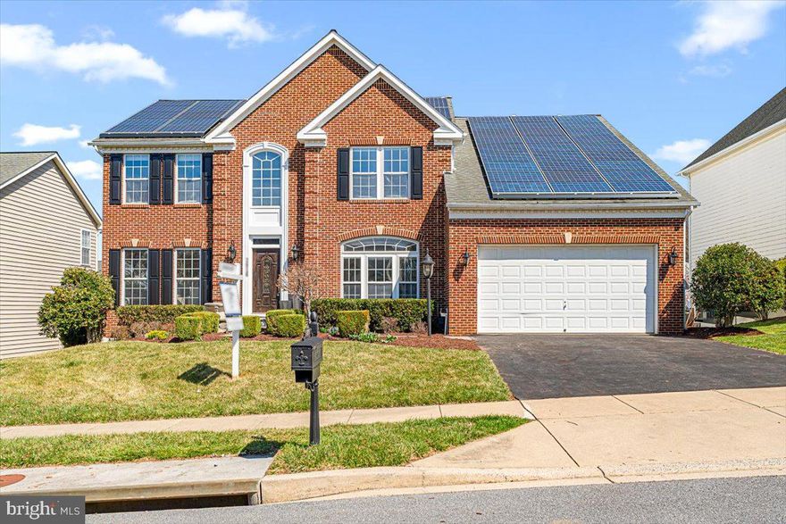 Welcome to this brick front Ryan Cortland model home in the highly sought-after Villages of Urbana. This home features over 5200 sq ft of living space, thanks to thoughtful 4-foot bump-outs that expand the already spacious floor plan. Once you walk inside your greeted with the  gleaming hardwood floors throughout, complemented by ceramic tile in the kitchen and breakfast room. A bright and airy first-floor office is perfect for remote work, while the elegant living room and formal dining room offer ample space for entertaining. The heart of the home is the oversized family room with a cozy gas fireplace sharing space with large kitchen ideal with plenty of space for preparing meals or hosting guests. Sliding glass doors open to a large deck overlooking a spacious backyard with garden complete with rain barrel water system. Upstairs, you'll find 4 generously sized bedrooms and 3 full baths, including a luxurious owner’s suite with two walk in closets with custom shelving. Enjoy the spa like bathroom complete with dual sinks, soaking tup, separate shower and private water closet. The lower level is an entertainer's dream, featuring a fully equipped au pair suite with a full kitchen, bath,  2 flex spaces that could be used as a bedroom and a walk-out to the private patio. The outdoor space is perfect for gatherings with a fully functional pizza oven, sink, and outdoor refrigerator, providing everything you need for al fresco dining and entertaining. 
Enjoy all that the Villages of Urbana has to offer with swimming pools, tennis, basketball courts, walking trails all within the Blue Ribbon School District of Urbana. Easy access to major commuting routes, shopping and dining.